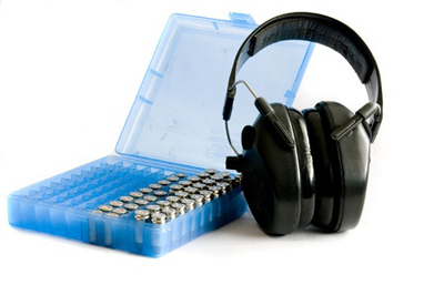 hearing protection and a blue case filed with ammunition